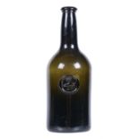 An 18th century sealed wine bottle