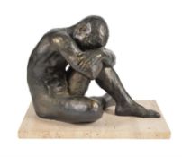 A bronzed terracotta model of a seated youth