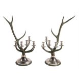 A pair of green painted antler and chromed metal mounted five light candelabra by Anthony Redmile