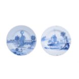 Two similar English delft blue and white plates