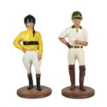 A companion pair of painted composition models of equestrians