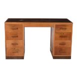 An Art Deco oak pedestal desk