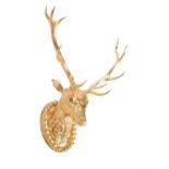 A gold coloured antler and composition stag's head wall mount by Anthony Redmile