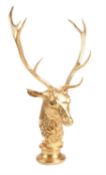 A gold coloured antler and composition model of a stag's head by Anthony Redmile