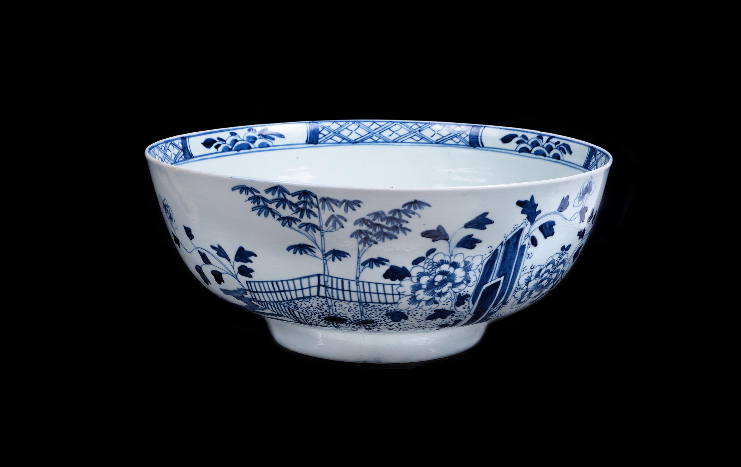 A Liverpool porcelain blue and white chinoiserie punch bowl