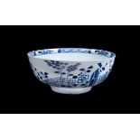 A Liverpool porcelain blue and white chinoiserie punch bowl
