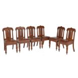A harlequin set of ten Gothic Revival oak and upholstered dining chairs
