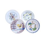 Four various English delft polychrome plates