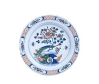 A Bristol delft polychrome chinoiserie charger