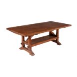 An Arts and Crafts oak refectory dining table