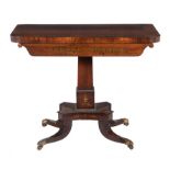 A Regency rosewood and brass inlaid card table