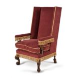 A walnut and velvet upholstered armchair