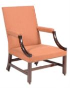 A mahogany and upholstered armchair