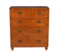 An Irish Victorian teak and brass bound campaign chest of drawers
