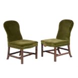 A harlequin pair of mahogany and upholstered side chairs