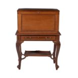 A mahogany and tulipwood banded writing cabinet