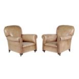 A pair of upholstered armchairs