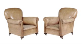 A pair of upholstered armchairs