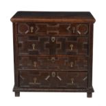 A Charles II oak chest of drawers