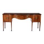 A George III mahogany and inlaid sideboard