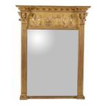 A Regency giltwood and composition overmantel wall mirror