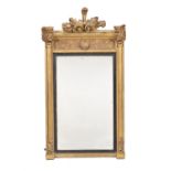 A George IV giltwood and composition wall mirror
