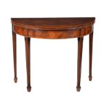 A George III mahogany folding card table