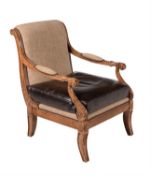 A simulated burr oak and upholstered library armchair in Regency style