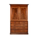 A George IV mahogany press cupboard