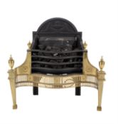A brass and cast iron fire grate in George III Adam style