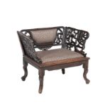 A Chinese stained hardwood low armchair