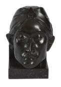 A Dutch patinated bronze relief sculpture of a male mask