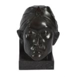 A Dutch patinated bronze relief sculpture of a male mask