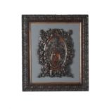 A Victorian carved and stained hardwood armorial plaque