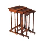 A George IV nest of three rosewood occasional tables