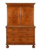 A walnut, burr walnut and crossbanded cabinet on chest