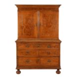 A walnut, burr walnut and crossbanded cabinet on chest