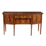 A George III mahogany and inlaid sideboard