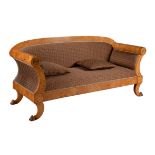 A maple and upholstered sofa