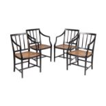 A set of four Sinhalese ebony elbow chairs in George III style
