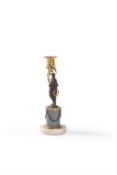 A Louis XVI gilt and patinated bronze and marble mounted figural candleholder