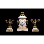 A white marble and ormolu mounted mantel clock