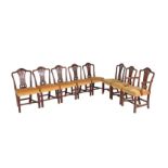 A set of eight mahogany dining chairs in George III style