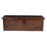 A Northern European carved walnut chest or coffer