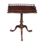 A George III mahogany tripod table with galleried top