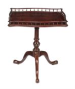 A George III mahogany tripod table with galleried top