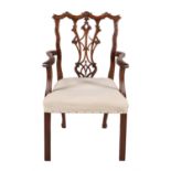 A carved mahogany armchair