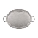 An Irish silver twin handled shaped oblong tray by Royal Irish Silver Co.