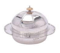 Y An Art Deco silver circular muffin dish, liner and cover by Northern Goldsmiths Co.