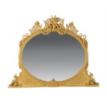 A late Victorian carved giltwood and composition overmantel mirror